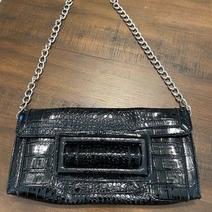 White House Black Market patent leather clutch with detachable strap.